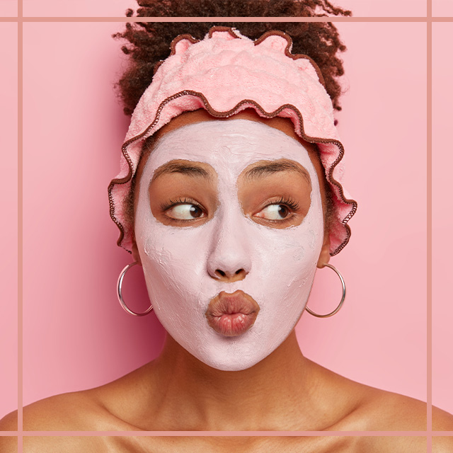 woman doing a facial with pink location